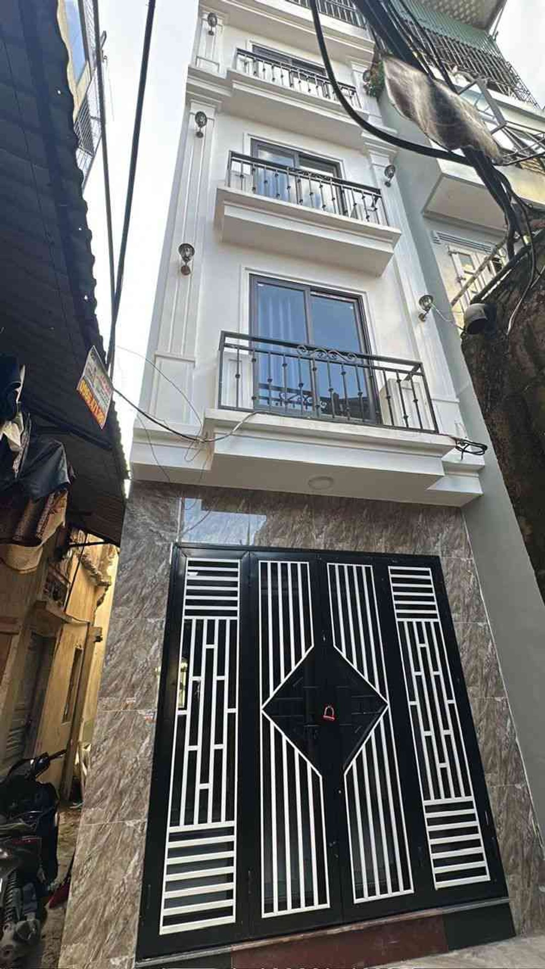 7.25 tỷ Nhà lô góc 5 tầng 3 phòng ngủ ô tô đỗ cổng tại Ngũ Nhạc ,Vĩnh Hưng