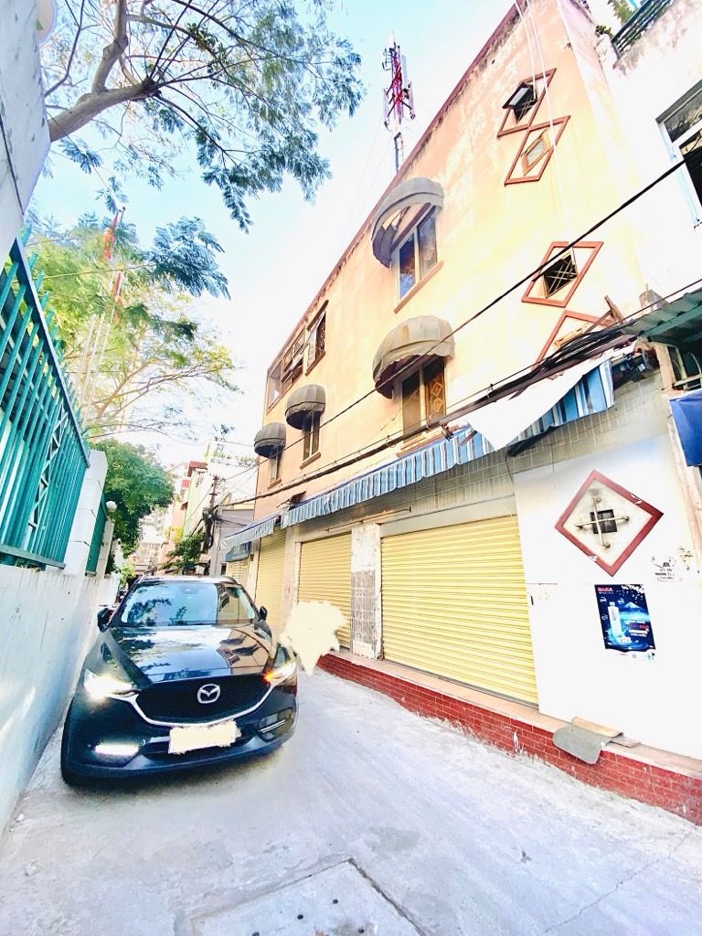 Bán nhà 3 tầng Ngô Tất Tố, góc 2 mặt tiền hẻm xe hơi, gần đại học Tôn Đức Thắng, sát metro, gần aua