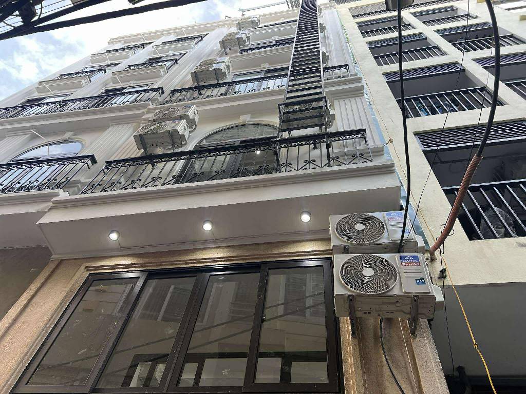 Bán nhà riêng 7 tầng tại phường Lê Quang Đạo, thiết kế 16 phòng khép kín, thang máy, ô tô đỗ cửa