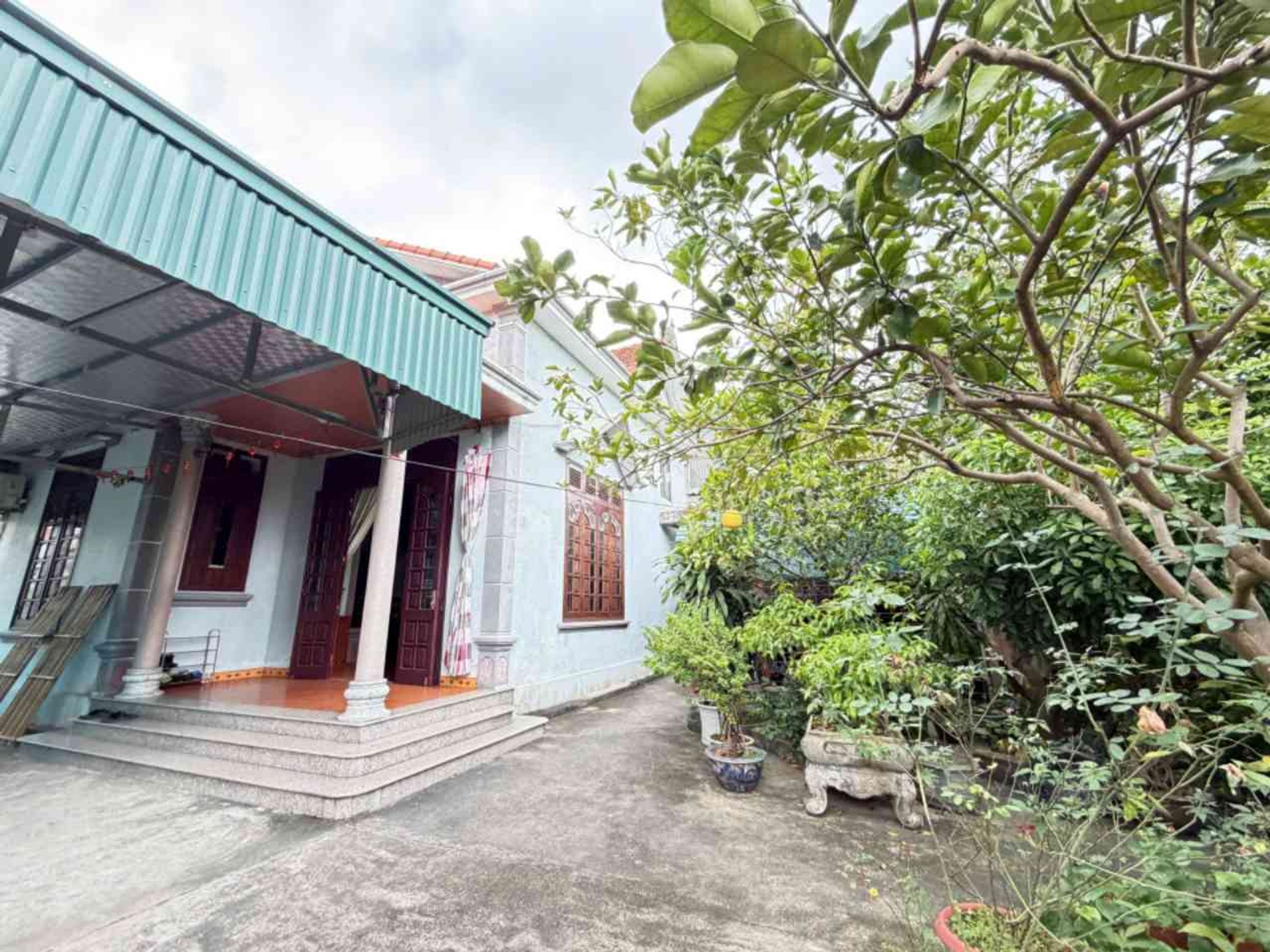 Bán nhà riêng 1 tầng hướng Bắc tại xã Cẩm Thịnh với sân vườn rộng và khu đỗ xe ô tô